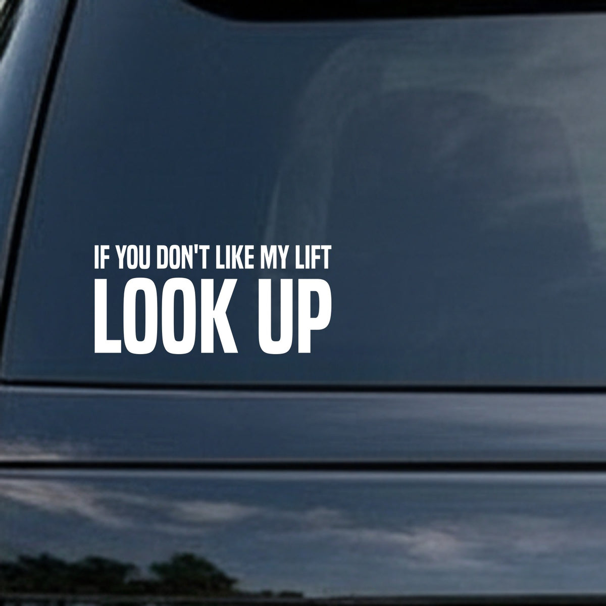 White bold text reading If You Don’t Like My Lift Look Up on a black background in a block font style
