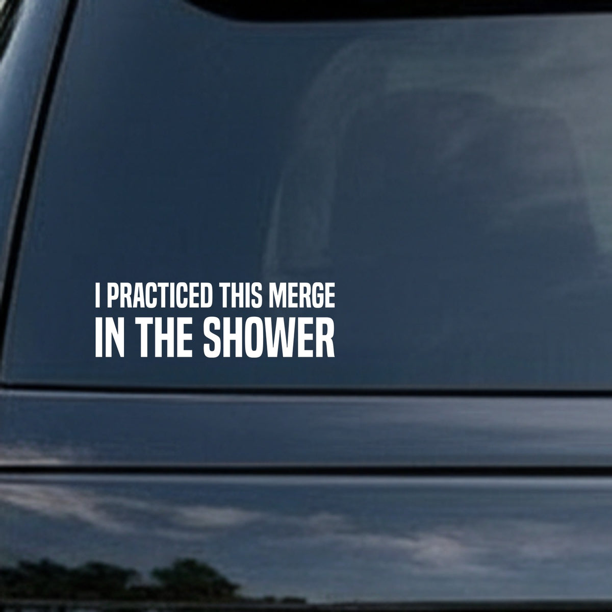 White bold text saying I Practiced This Merge In The Shower on a black rectangular background in a clean sans serif font