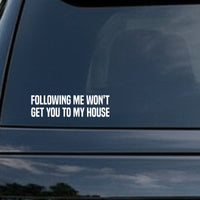 White bold text on black background reading 'FOLLOWING ME WON'T GET YOU TO MY HOUSE' in all caps, simple block style