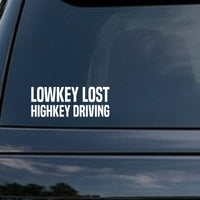 White bold block text saying Lowkey Lost Highkey Driving on a black background in all capital letters