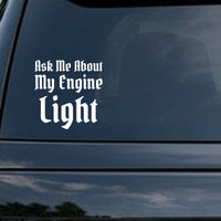 White Gothic Old English font lettering saying Ask Me About My Engine Light on a black background
