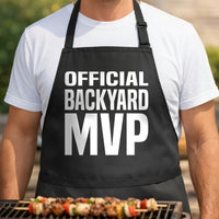 Black apron with large bold white text that reads Official Backyard MVP in a clean block font on front.