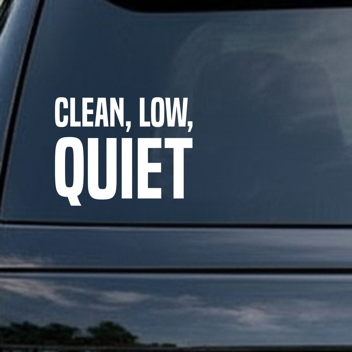 White bold text saying 'Clean, Low, Quiet' on a solid black background in a clean block font style.
