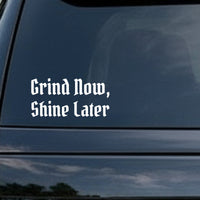 White gothic blackletter Old English style text reading Grind Now, Shine Later on solid black background