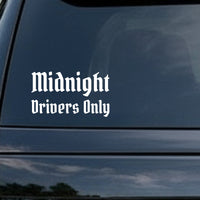 White gothic blackletter Old English font phrase 'Midnight Drivers Only' on a black background in a bold vinyl decal style.