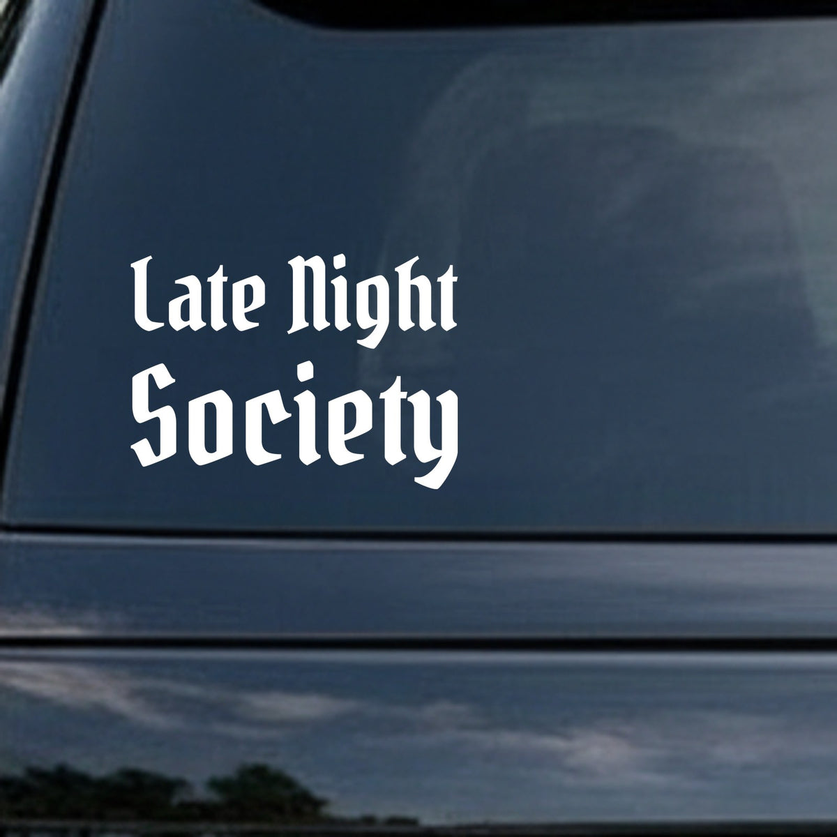 White vinyl sticker displaying 'Late Night Society' in gothic blackletter font on a black background.