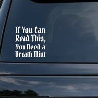 White gothic blackletter text saying If You Can Read This You Need a Breath Mint on a black background