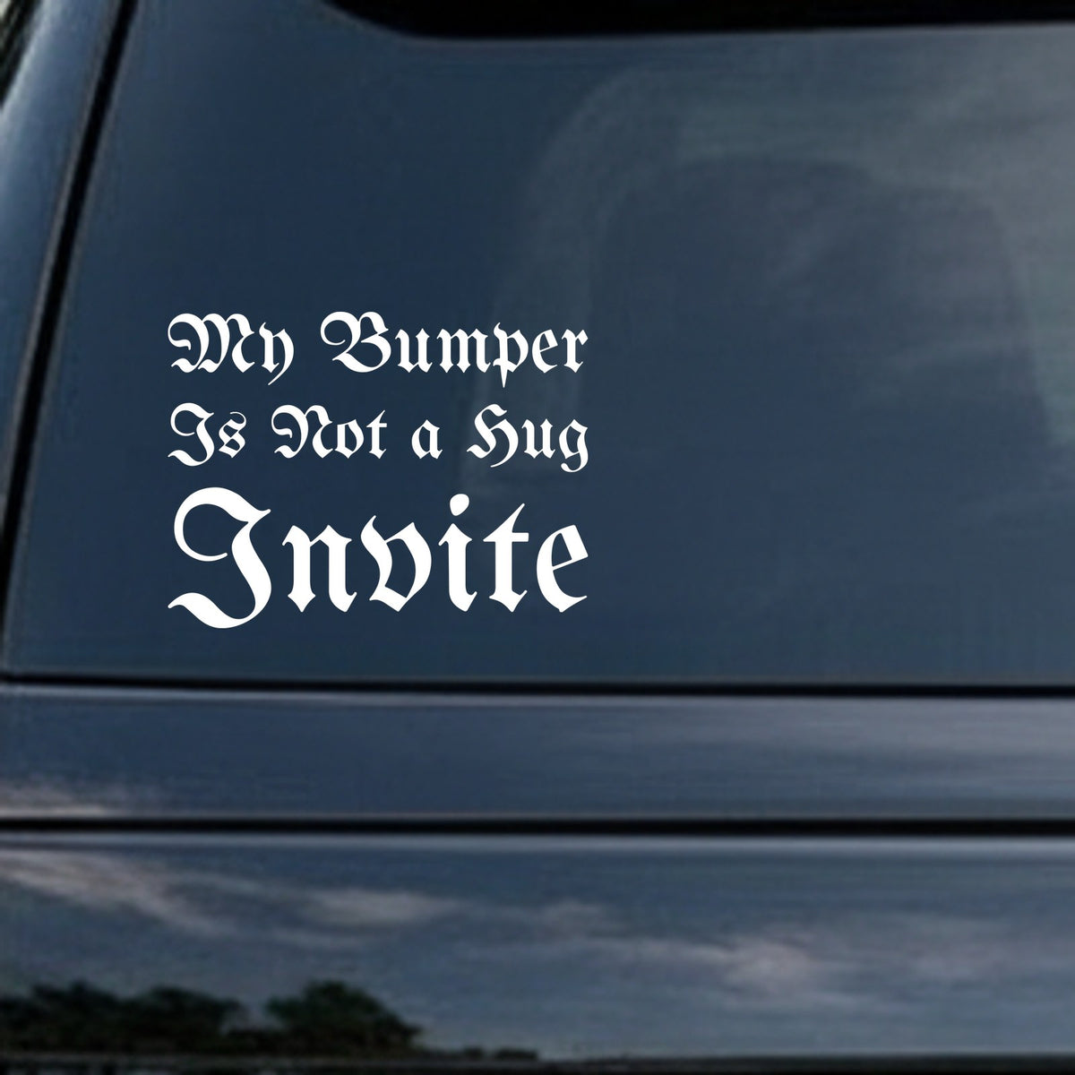 White gothic blackletter font saying My Bumper Is Not a Hug Invite on a black background in a bold Old English style lettering