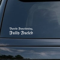 White gothic blackletter text saying 'Barely Functioning, Fully Fueled' on black background in Old English style font.