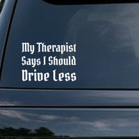 White gothic blackletter text reading 'My Therapist Says I Should Drive Less' on a solid black background in a vintage style.
