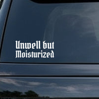 White gothic blackletter lettering spelling 'Unwell but Moisturized' on black background in Old English style font