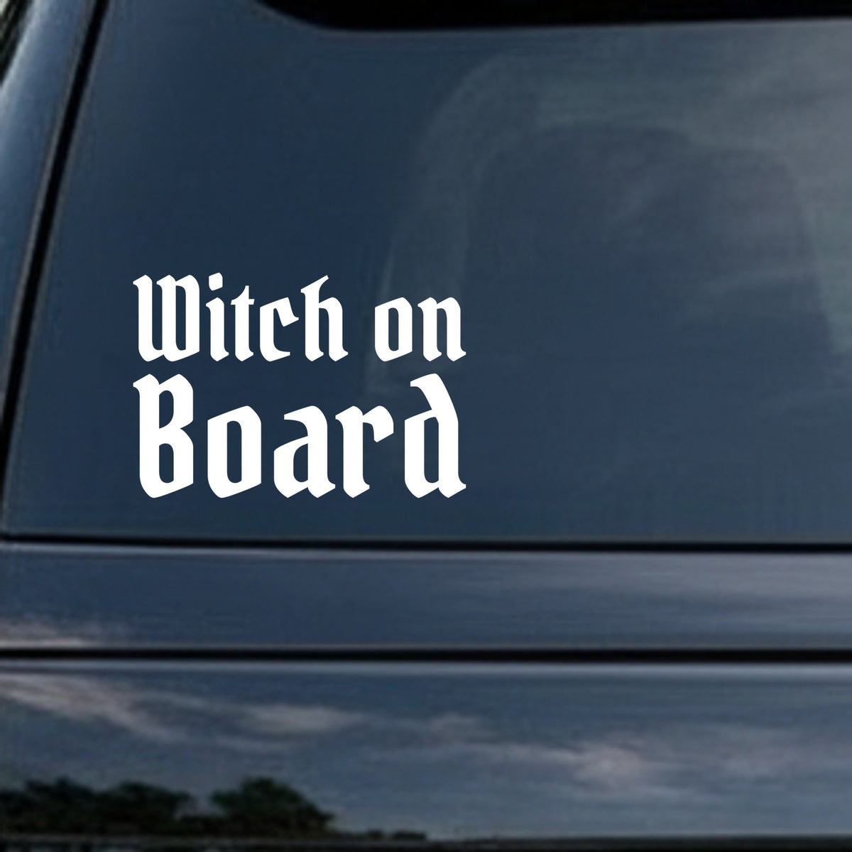 White gothic blackletter text reading 'Witch on Board' on a solid black background in an Old English style font.