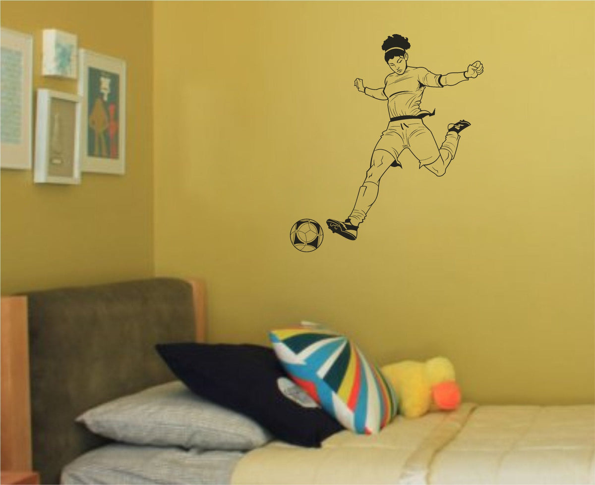 Black and white illustration of a soccer player kicking a ball with focus, wearing sportswear and cleats in action pose.