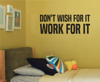 Black vinyl wall decal with the quote "Don't Wish for It Work for It" in bold block letters on a plain white background.