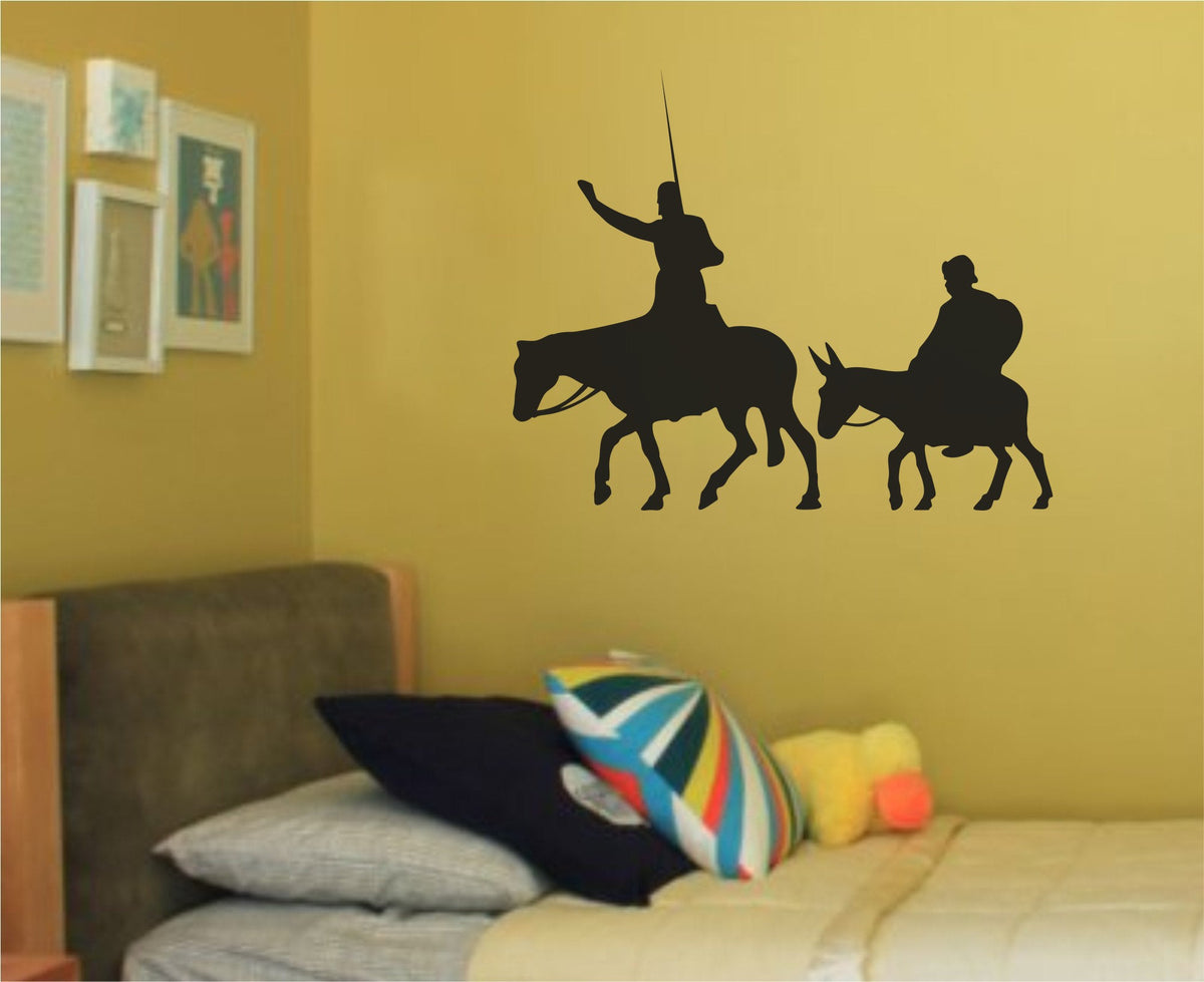 Black silhouette of Don Quixote riding a horse with a lance and Sancho Panza sitting on a donkey, side profile on white background.