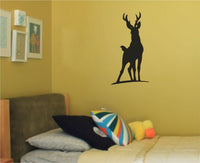 Black vinyl silhouette of a standing deer with antlers on a plain white background in a simple cutout style.