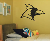 Black silhouette of a cardinal bird head with bold outlines and stylized details on a white background.