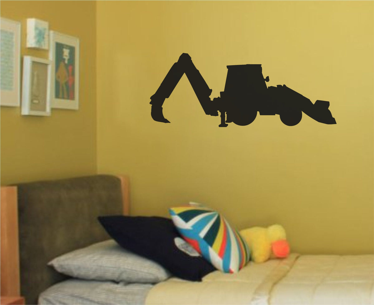 Silhouette of a black backhoe construction vehicle with digging arm and loader bucket on white background