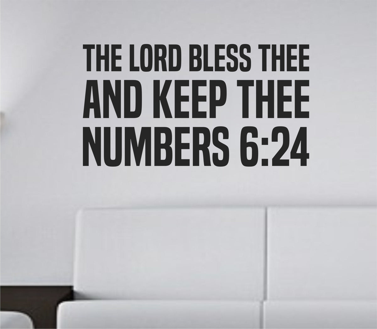 Black vinyl wall decal showing the Bible verse 'The Lord Bless Thee And Keep Thee' in Built Titling font on a white background.