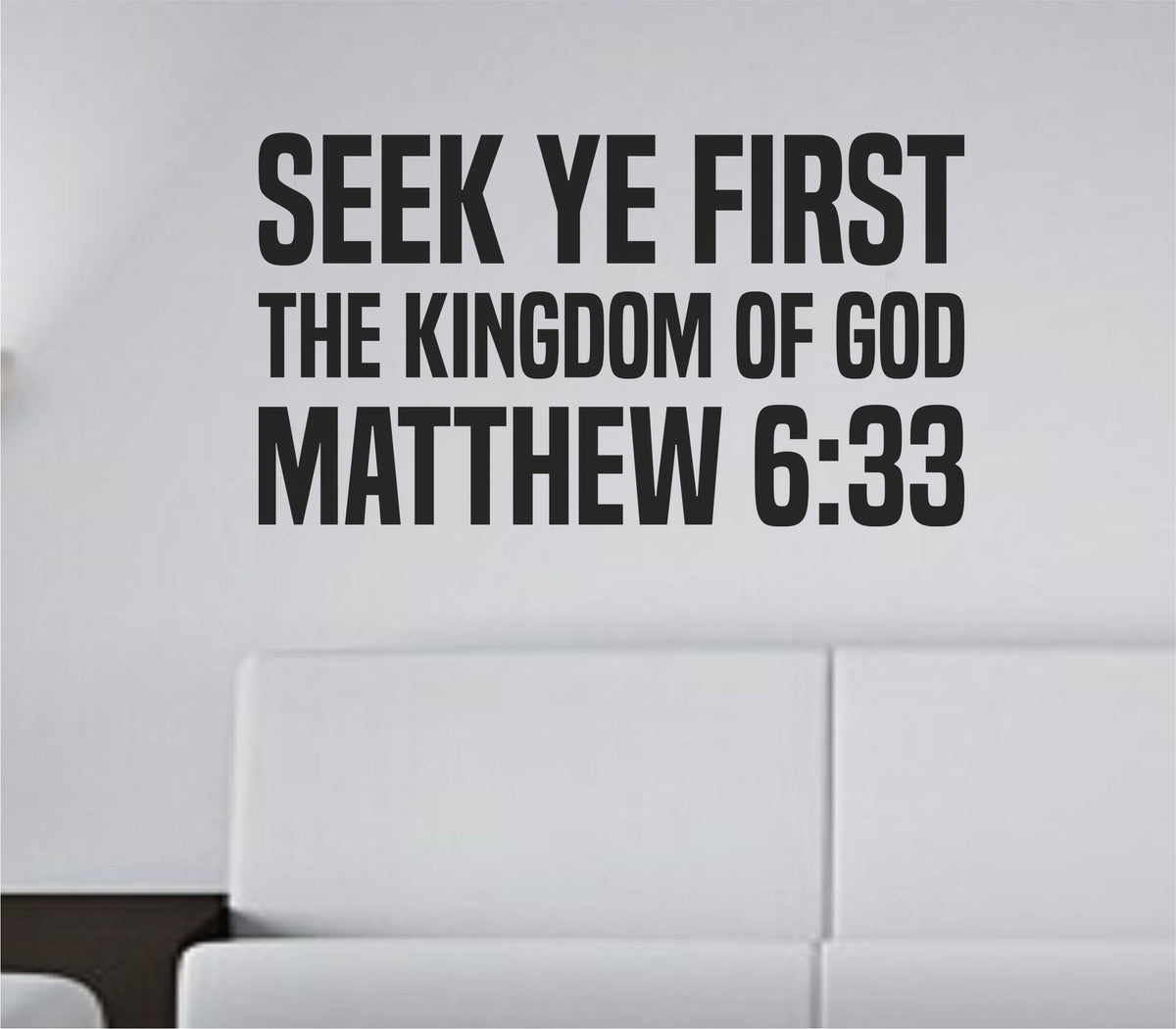 Black vinyl wall decal with the text SEEK YE FIRST THE KINGDOM OF GOD in bold tall block letters on white background.