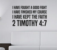 Black vinyl wall decal with bold block letters displaying 2 Timothy 4:7 Bible verse in uppercase text on white background