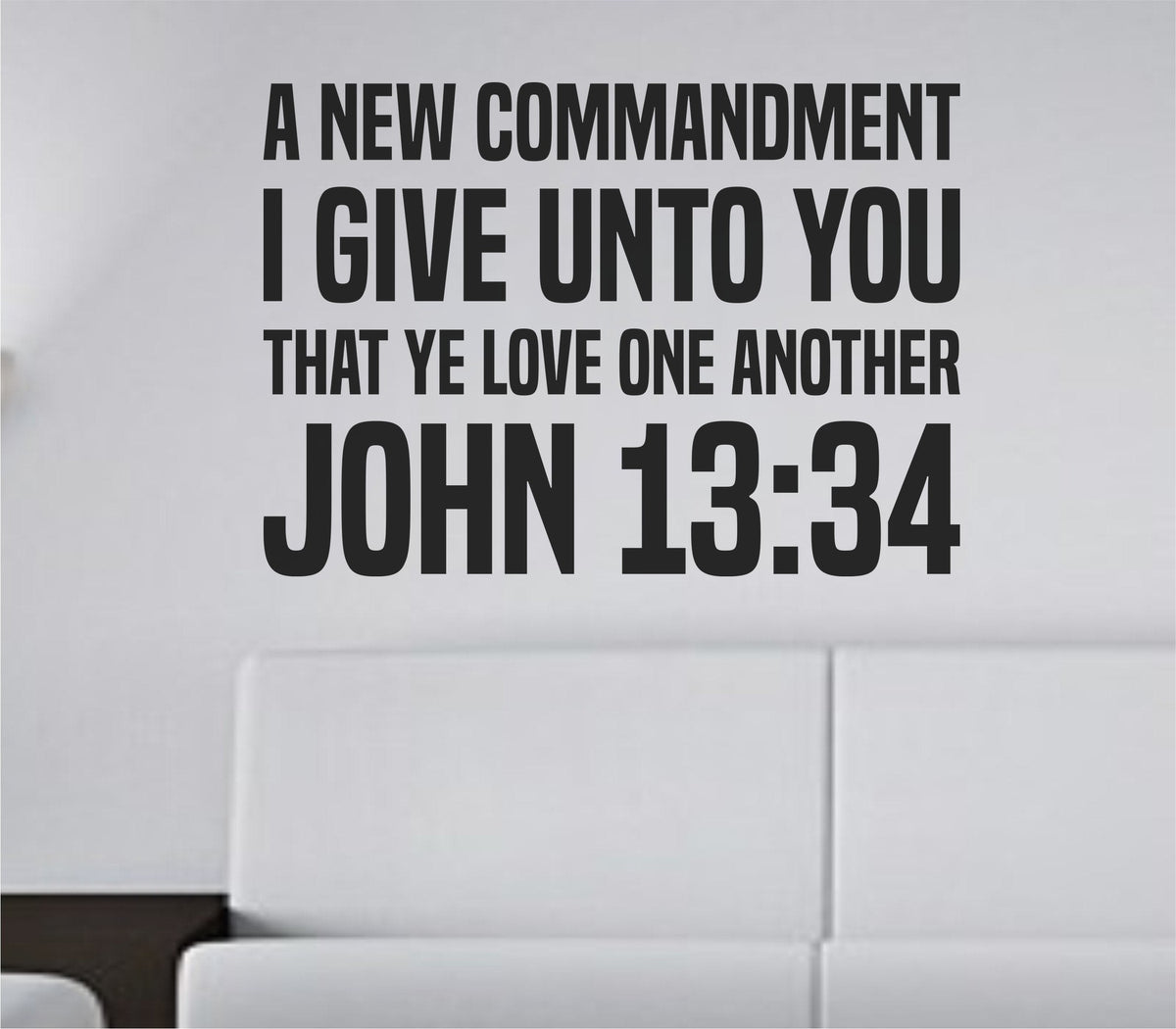 Black bold block lettering vinyl wall decal of John 13:34 Bible verse on white background, Christian scripture quote.