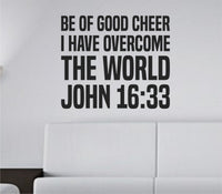 Black vinyl wall decal with bold tall block letters showing John 16:33 scripture quote in a clean modern style.