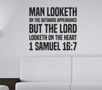 Bold black block lettering vinyl wall decal of 1 Samuel 16:7 Bible verse about appearance and heart on white background
