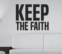 Black vinyl wall decal with the phrase KEEP THE FAITH in large, bold, tall block letters on a white background.