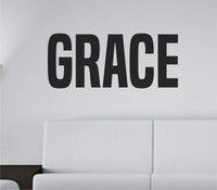 Bold tall block lettering spelling the word GRACE in one solid color on a white background