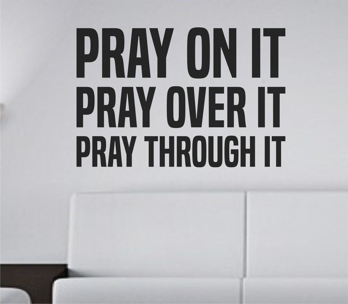 Black bold tall block lettering vinyl wall decal with the words Pray On It Pray Over It Pray Through It on white background