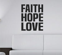 Black vinyl wall decal with the words FAITH HOPE LOVE in bold tall block letters on a white background