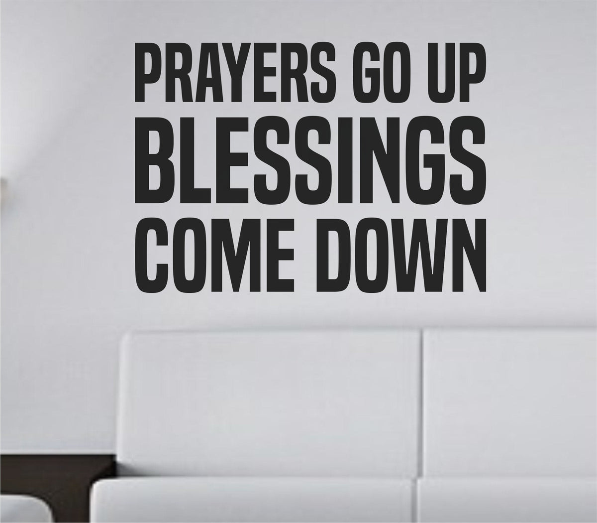 Black bold tall block lettering wall decal with the phrase Prayers Go Up Blessings Come Down on white background.