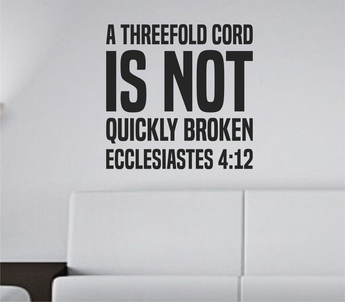 Black bold tall block lettering vinyl wall decal displaying Ecclesiastes 4:12 scripture quote on a white background