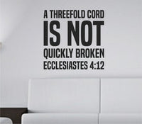 Black bold tall block lettering vinyl wall decal displaying Ecclesiastes 4:12 scripture quote on a white background