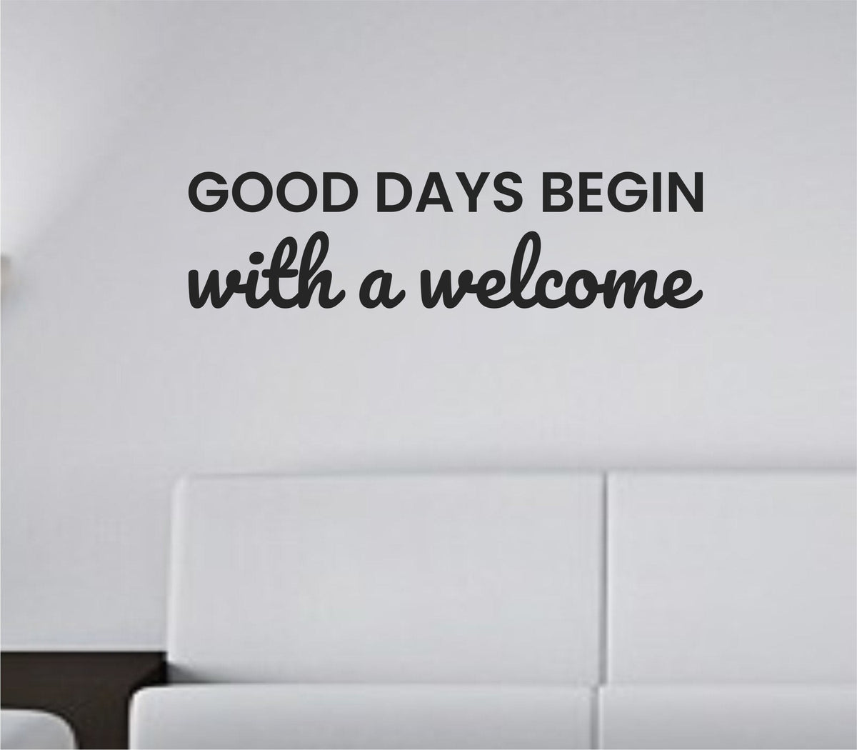 Black vinyl wall decal quote saying Good days begin with a welcome on a white background in simple modern font