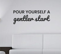 Black vinyl wall decal with the quote 'Pour yourself a gentler start.' in elegant script on a white background.