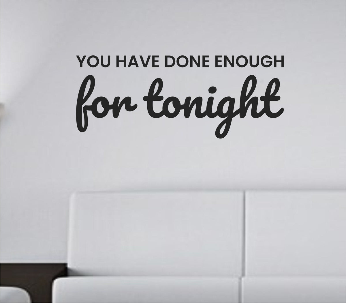 Black vinyl wall decal with the quote 'You have done enough for tonight.' in simple, modern font on a white background