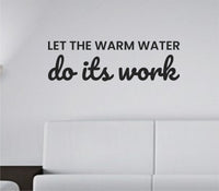 Black vinyl wall decal with the phrase Let the warm water do its work in a clean, simple font on a white background.