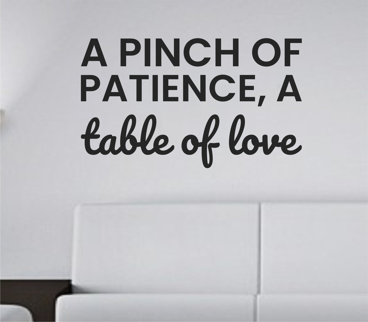 Black vinyl wall decal with the quote 'A pinch of patience, a table of love.' in simple handwritten style on white background.