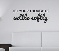 Black vinyl wall decal with the quote 'Let your thoughts settle softly' in simple, elegant script on a white background.