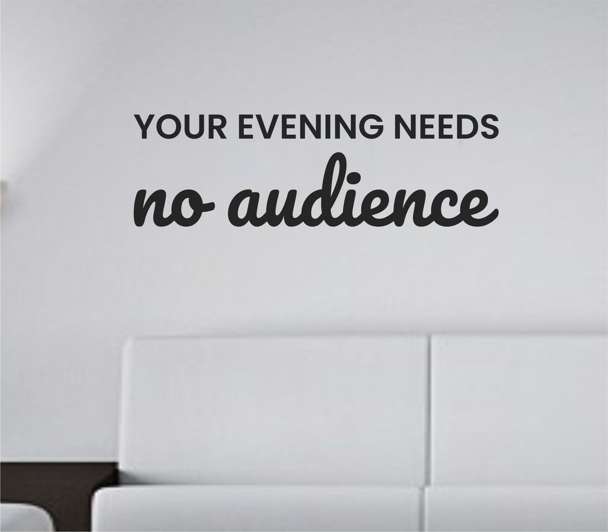 Black vinyl wall decal with the phrase 'Your evening needs no audience' in simple elegant font on white background