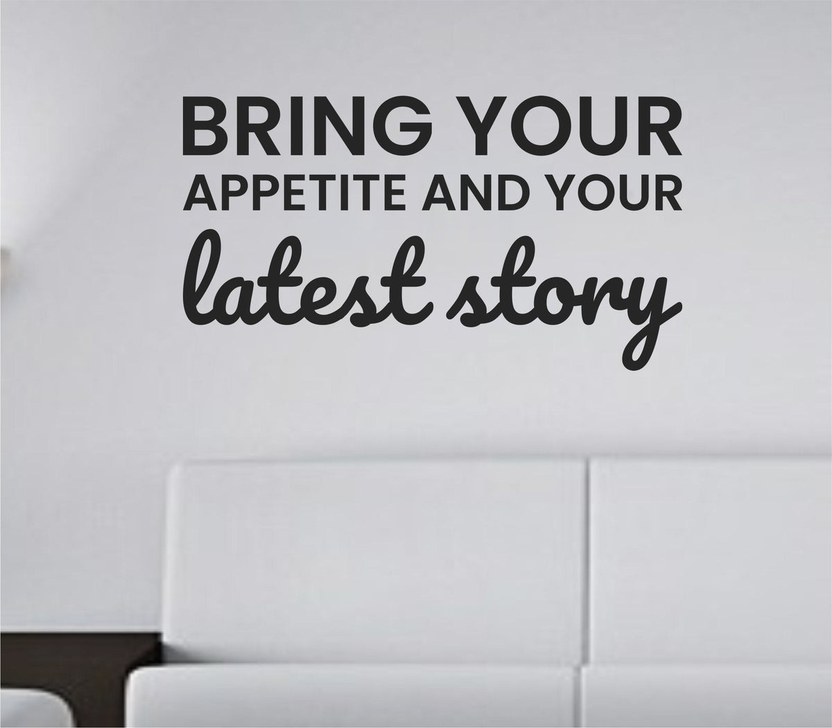 Black vinyl wall decal with the quote 'Bring your appetite and your latest story.' in simple black text on white background.