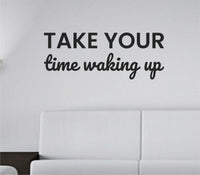 Black vinyl wall decal with the phrase 'Take your time waking up.' in a clean, modern font on a white background.