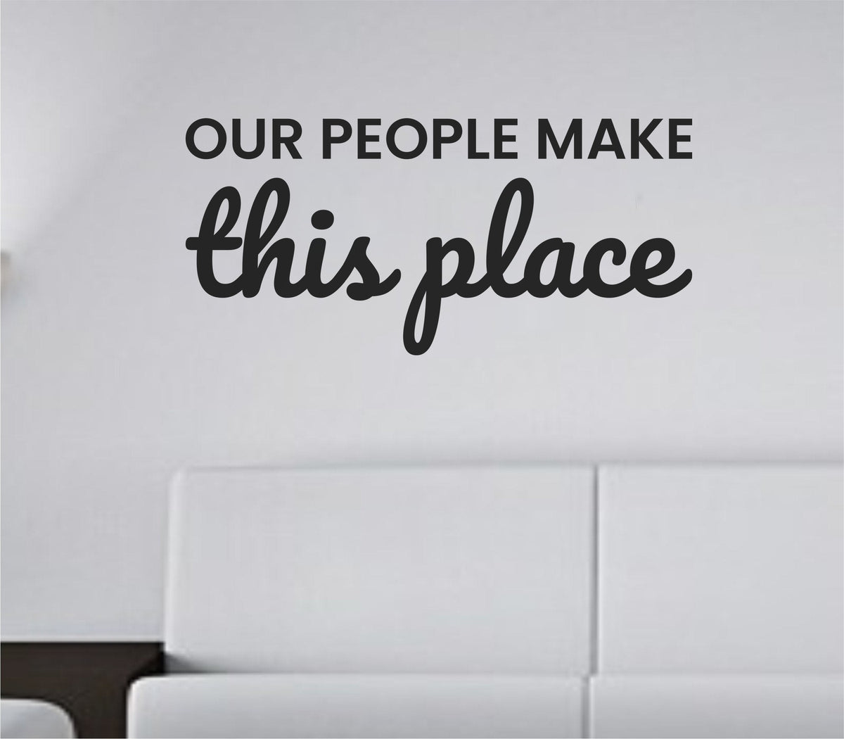Black vinyl wall decal with the phrase Our People Make This Place in simple modern font on white background.