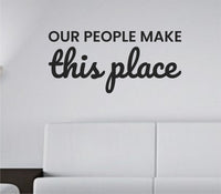 Black vinyl wall decal with the phrase Our People Make This Place in simple modern font on white background.