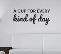 Black vinyl wall decal with the phrase 'A cup for every kind of day' in elegant script on a white background.