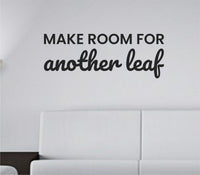 Black vinyl wall decal with the phrase Make room for another leaf in a simple script font on a white background