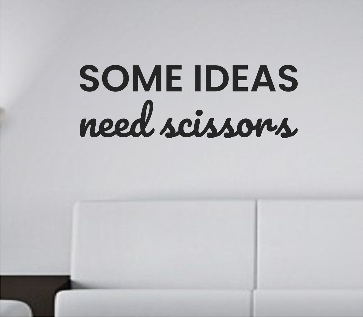 Black vinyl wall decal with the phrase 'Some Ideas Need Scissors' in a clean, modern font on a white background.