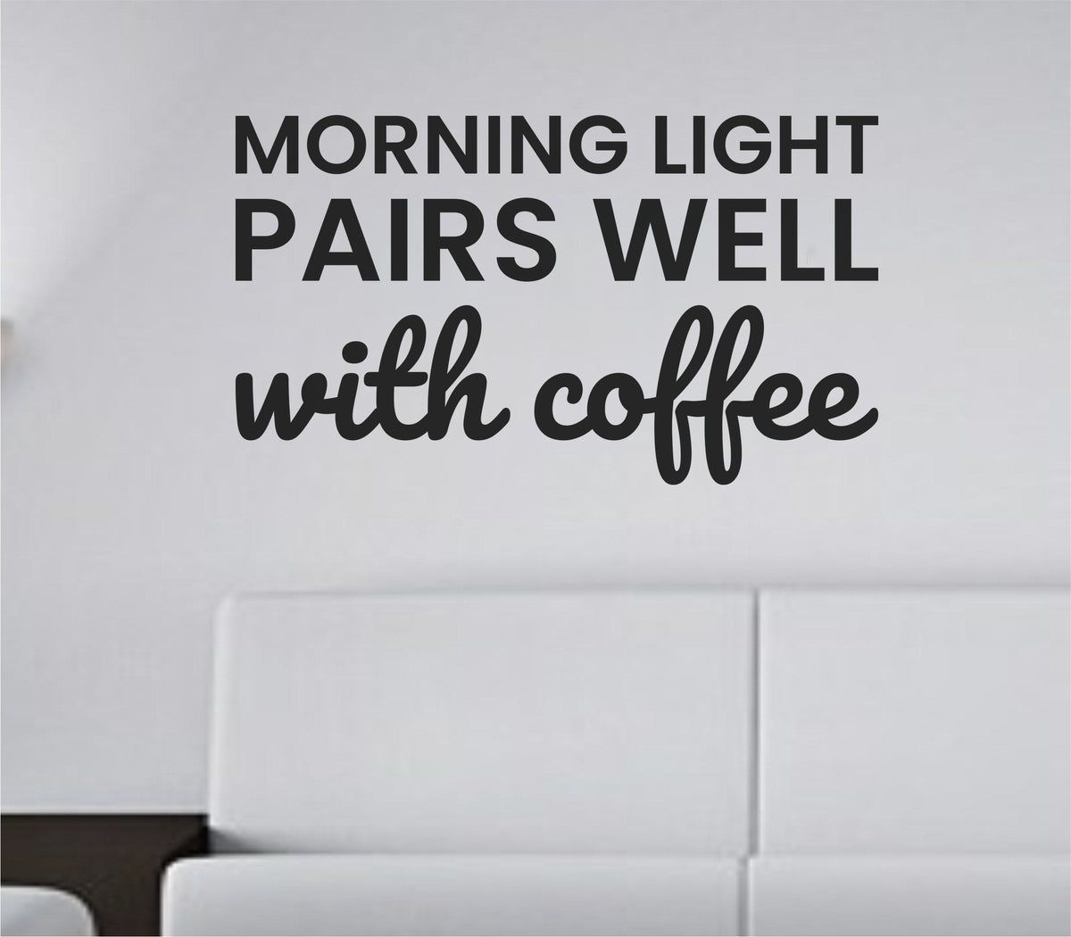 Black vinyl wall decal quote reading 'Morning light pairs well with coffee.' in simple, clean typography on white background.